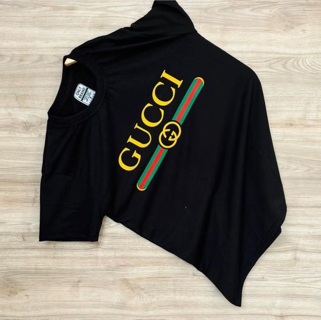 Elevate your everyday style with this sleek Gucci black t-shirt
